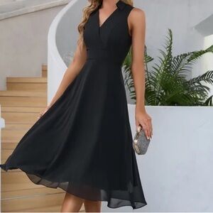 Black dress in Large from JJ’s house. Never worn, still has tags!